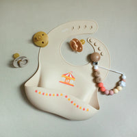 Silicone Baby Bib | Merry-Go-Round - Cream